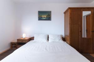 Postel nebo postele na pokoji v ubytování Beachfront apartments Calm Sea