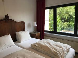 Postel nebo postele na pokoji v ubytování Holiday home Keysersnest