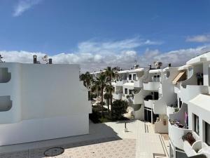arial view of a white apartment building at Clarissa Apartment in Costa de Antigua