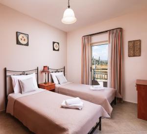 Ένα ή περισσότερα κρεβάτια σε δωμάτιο στο Villa Eleni +29 φωτογραφίες