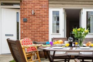 a patio with a table with food on it at Number Two in Southampton