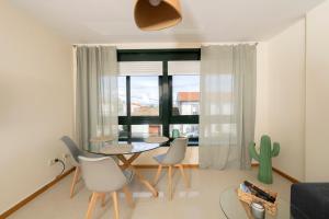 Posedenie v ubytovaní Apartamento Bertorella Playa de Langosteira en Finisterre con vistas al mar