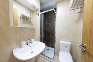 Koupelna v ubytování Apartamento Lura de Fisterra Playa de Langosteira en Finisterre con vistas al mar