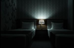 TASHRIF HOTEL客房内的一张或多张床位