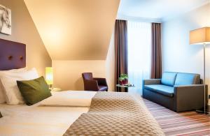 Posezení v ubytování Leonardo Hotel Hamburg Stillhorn + 37 fotografií