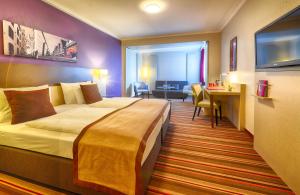 Cama o camas de una habitación en Leonardo Hotel Köln