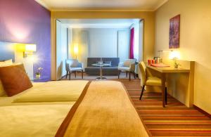 Cama o camas de una habitación en Leonardo Hotel Köln