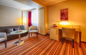 Zona de estar de Leonardo Hotel Köln