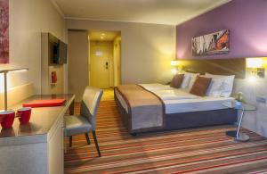 Cama o camas de una habitación en Leonardo Hotel Köln