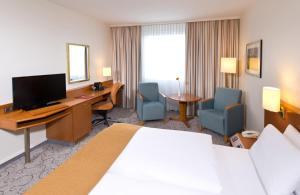TV a/nebo společenská místnost v ubytování Leonardo Hotel Heidelberg