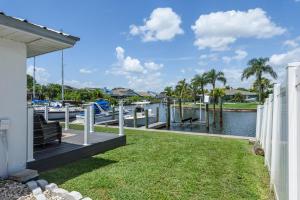 a view of a marina from a house at Updated Waterfront Condo in Apollo Beach in Apollo Beach