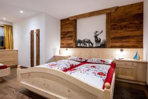 Voodi või voodid majutusasutuse Alpenappart App Dreiherrenspitze toas