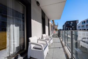 En balkon eller terrasse på Best Stay KRK