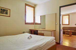 Postel nebo postele na pokoji v ubytování Thermal Apartments Lendava + 37 fotografií