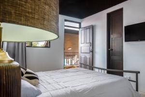 Voodi või voodid majutusasutuse Hotel Cañas toas