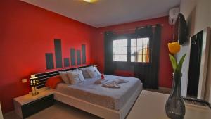 Postel nebo postele na pokoji v ubytování Villa Celeste + 37 fotografií