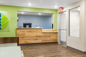The lobby or reception area at WoodSpring Suites Toledo Maumee