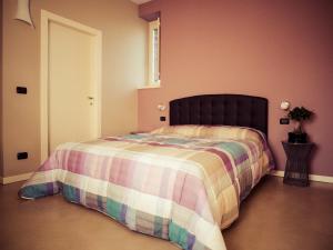 Postel nebo postele na pokoji v ubytování B&B Aurora