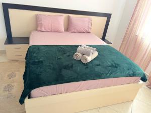 Postel nebo postele na pokoji v ubytování Sol Apartment