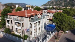 an aerial view of a building with a swimming pool at Arya Otel in Marmaris
