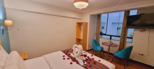 Μια τηλεόραση ή/και κέντρο ψυχαγωγίας στο HOTEL LUZ GARDEN
