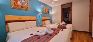 Ένα ή περισσότερα κρεβάτια σε δωμάτιο στο HOTEL LUZ GARDEN