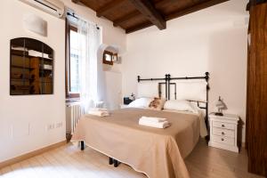 Lova arba lovos apgyvendinimo įstaigoje Dolce Vita Fiorentina a 5 minuti da Duomo e Uffizi