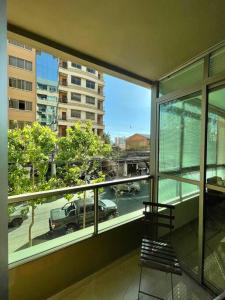 a room with a window with a view of a street at Deluxe Department in Cochabamba