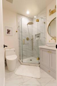 a bathroom with a shower and a toilet and a sink at Home in the heart of willow Glen San Jose in San Jose