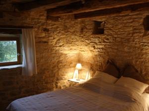 Posteľ alebo postele v izbe v ubytovaní Gîte du Petit Olivier - 2 à 4 pers -1 chb + 33 fotografií