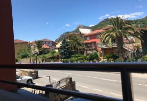 a view of a street from a balcony at Lapaserina B in Arenas de Cabrales