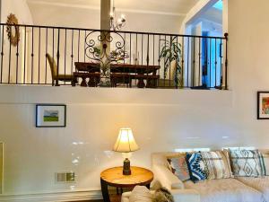 a living room with a couch and a table at Entire villa on Sunset Strip in Los Angeles