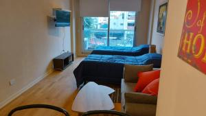 Una televisión o centro de entretenimiento en Ceci