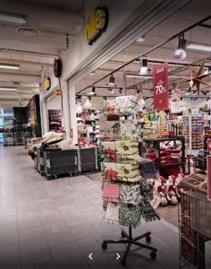 a store aisle with a lot of items on display at Apartment in Sandvika Bærum - Great view and Attractive in Østre Jong