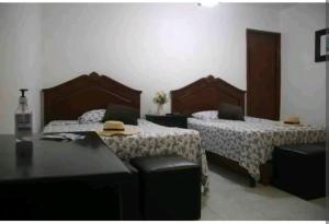 Katil atau katil-katil dalam bilik di Beautiful Rooms at playa Blanca