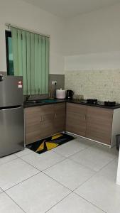 Dapur atau dapur kecil di D Naurah Meritus Guesthouse