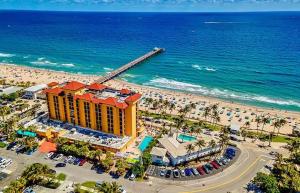 an aerial view of a resort on the beach at 2 Miles To Pompano Beach 4bd 2ba With Pool in Pompano Beach