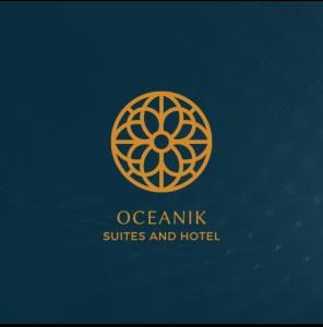 een logo voor een oceaniki suites en hotel bij OCEANIk SUITES & HOTEL in Guayaquil