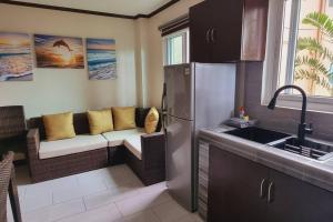 Kuchyň nebo kuchyňský kout v ubytování Balay sa bukid (1bedroom)