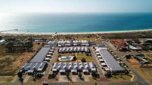 an aerial view of a parking lot next to the beach at Unit 48 Seafront Estate in Jurien Bay