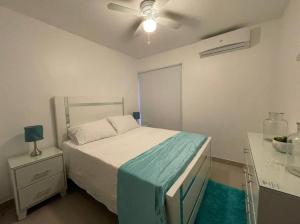 Residencial Habitat房間的床