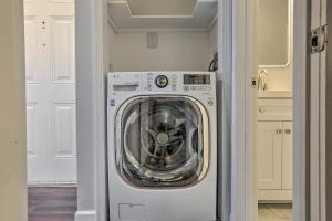 a washer and dryer in a laundry room at Vernon Township Condo - Walk to Ski Resort! in Vernon Township