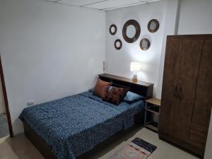 Cama o camas de una habitación en SUITES AMOBLADA
