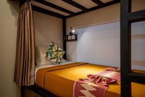 Letto o letti in una camera di The Moon Hostel