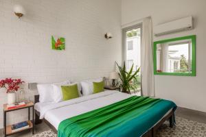 Ένα ή περισσότερα κρεβάτια σε δωμάτιο στο La Olalian Estate