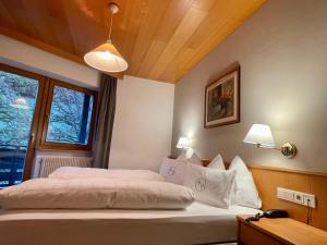 Posteľ alebo postele v izbe v ubytovaní Alpinhotel Vajolet - Adults only