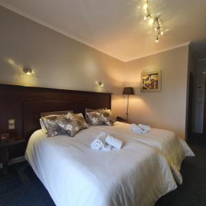 A bed or beds in a room at Liknon
