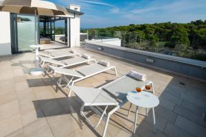 Balkón alebo terasa v ubytovaní Aparthotel Punta Blu - POOL & SPA