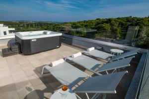 Balkón alebo terasa v ubytovaní Aparthotel Punta Blu - POOL & SPA
