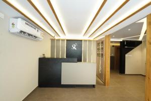 a room with a white table in a room at Southern Residency in Cochin